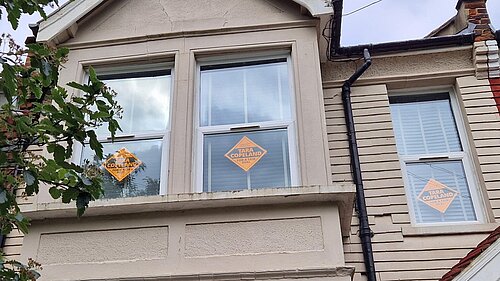 Liberal Democrat posters in the window of a house