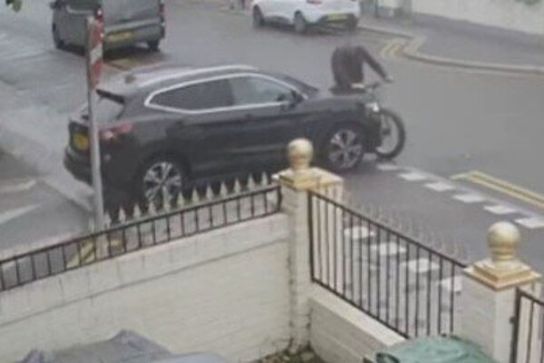 A car striking a cyclist on Grove Green Road