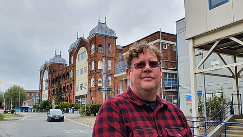 Arran Angus outside Whipps Cross Hospital